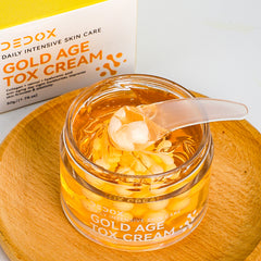 DEDOX Gold Age Tox Cream jar with golden capsules - Korean skincare anti-ageing moisturiser